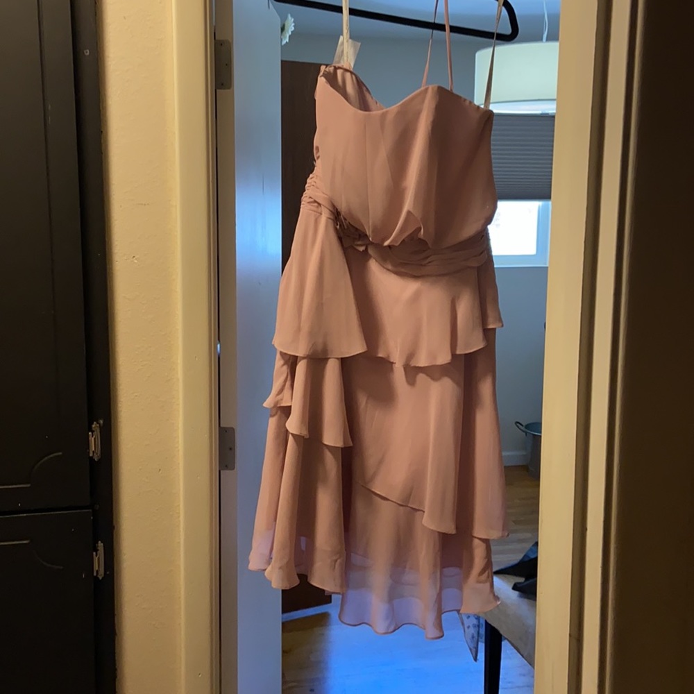 Fun spring dress, never been worn only fitted for a bridal shoot.